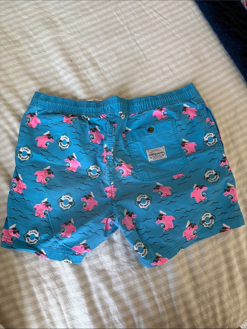 Party Pants- Teal Swim Shorts with Pink Dolphin Print